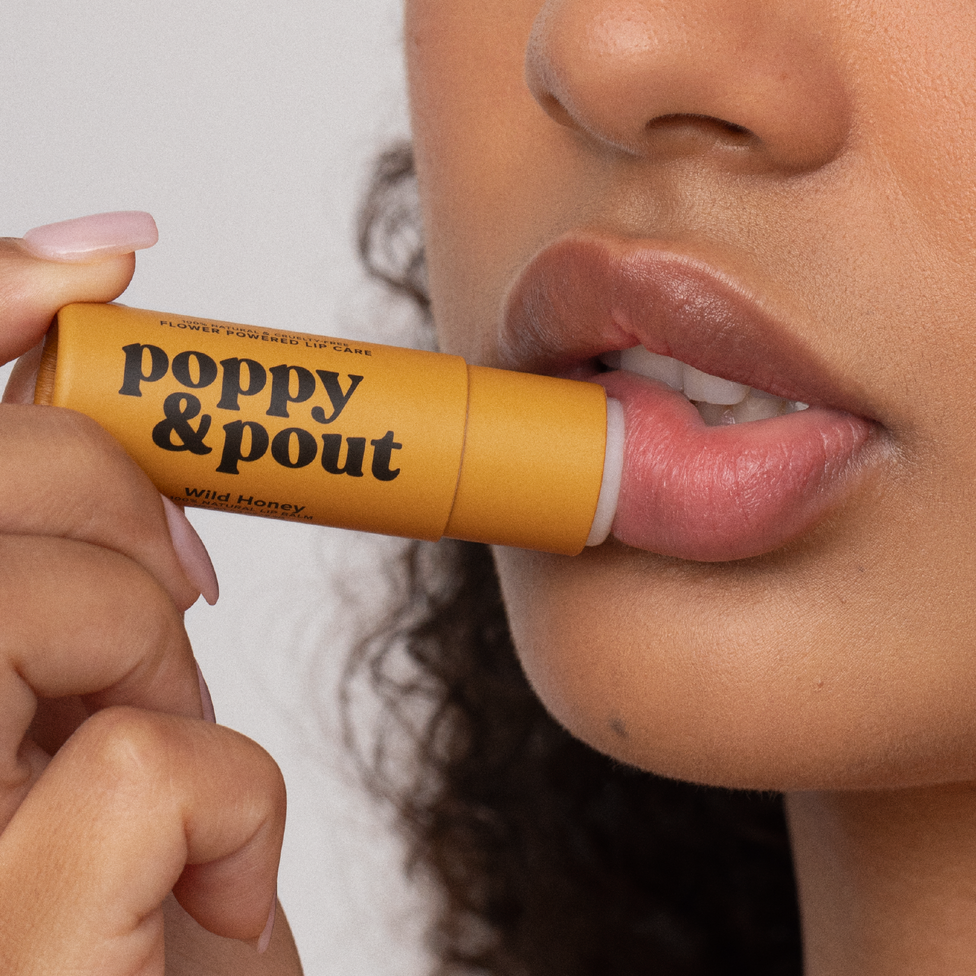 Buttercream Birthday Cake Flavored Lip Balm in Wild Honey